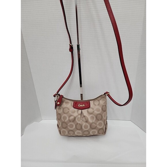 COACH ASHLEY DOTTED OP ART KHAKI JACQUARD CHERRY RED LEATHER CROSSBODY SWINGPACK - Picture 1 of 15